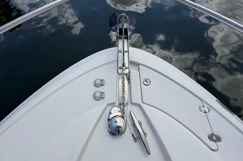 Slide: The Image of Bow of 2007 Monterey 350 Sport Yacht with anchor and calm water reflection. - 57