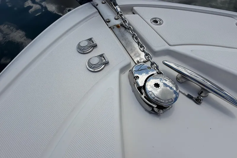 Slide: The Image of Bow of 2007 Monterey 350 Sport Yacht with anchor chain and cleat. - 58