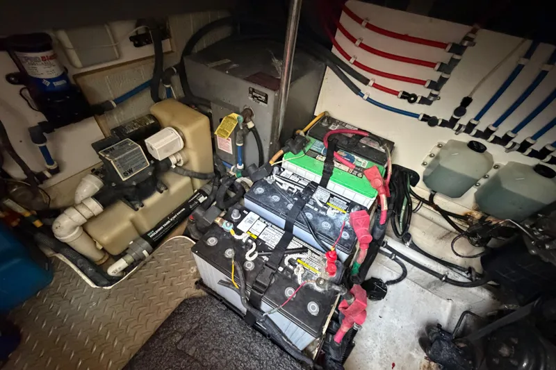 Slide: The Image of Engine room of a 2007 Monterey 350 Sport Yacht with batteries and wiring. - 61