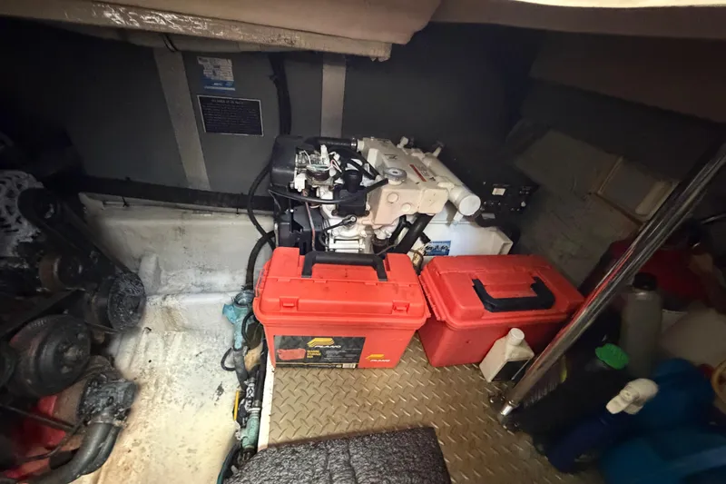 Slide: The Image of Engine room of a 2007 Monterey 350 Sport Yacht with tools and equipment. - 63