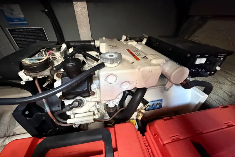 Slide: The Image of Engine compartment of a 2007 Monterey 350 Sport Yacht, showcasing mechanical components. - 64