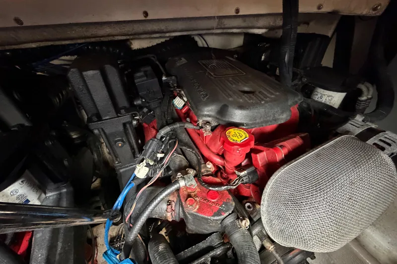 Slide: The Image of Engine compartment of a 2007 Monterey 350 Sport Yacht, showcasing mechanical components. - 69