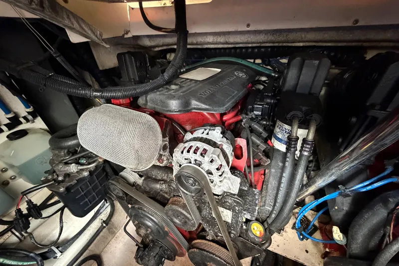Slide: The Image of Engine compartment of a 2007 Monterey 350 Sport Yacht, featuring a Volvo Penta engine. - 70