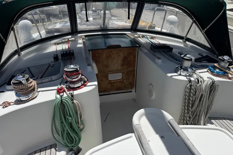 Slide: The Image of Cockpit of 1997 Beneteau Oceanis 461 sailboat with ropes and winches. - 23