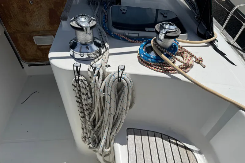Slide: The Image of Deck of 1997 Beneteau Oceanis 461 sailboat with winches and ropes. - 24