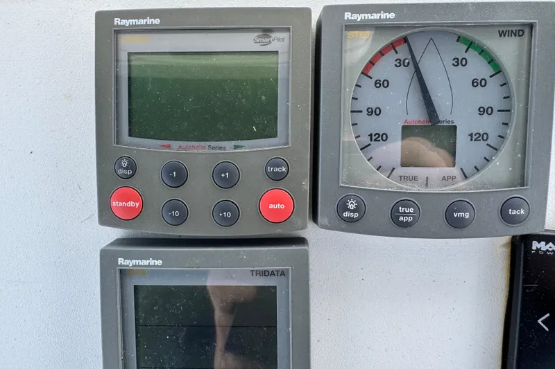 Slide: The Image of Raymarine navigation instruments on a 1997 Beneteau Oceanis 461 sailboat. - 30