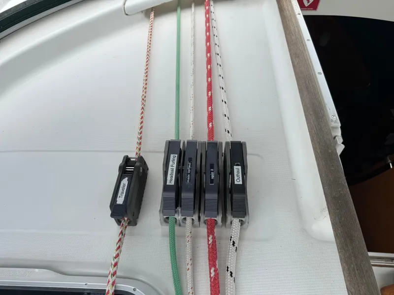 Slide: The Image of Close-up of rope clutches on a 1997 Beneteau Oceanis 461 sailboat deck. - 34