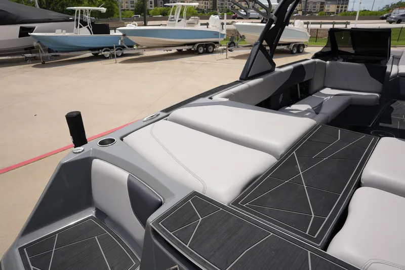 Slide: The Image of Interior of a 2021 ATX 24 Type-S boat on a parking lot. - 13