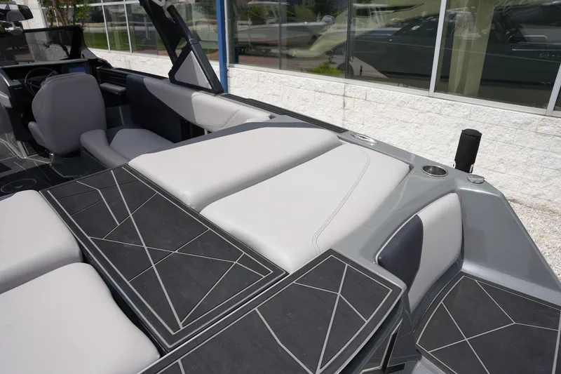 Slide: The Image of Interior of a 2021 ATX 24 Type-S boat with gray seating. - 14