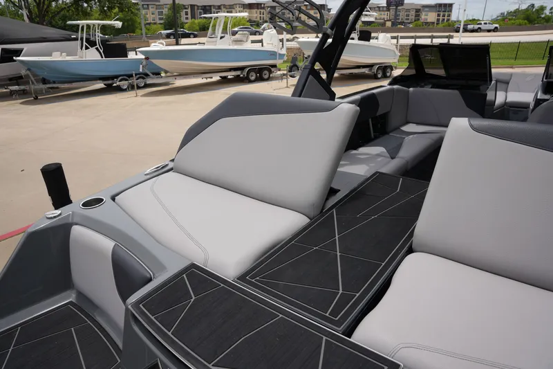Slide: The Image of Interior of a 2021 ATX 24 Type-S boat with gray seating. - 15