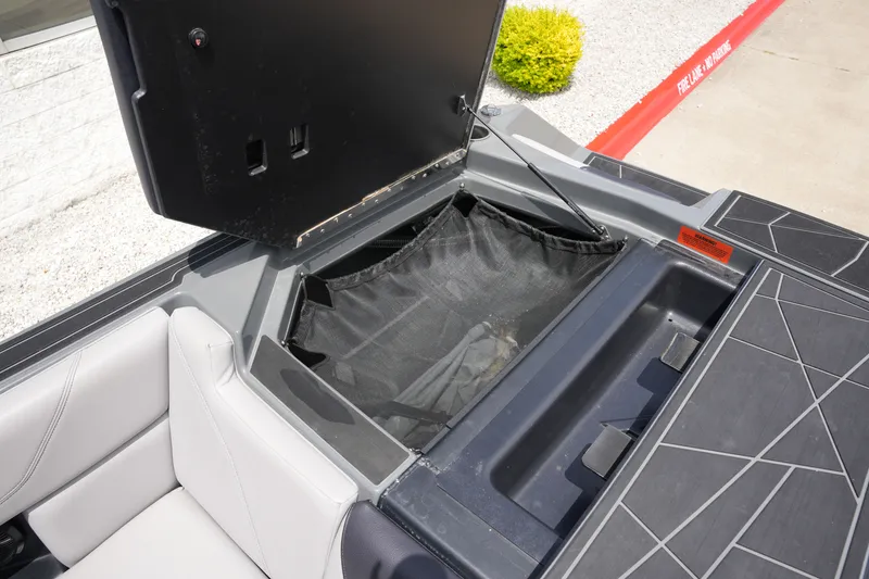 Slide: The Image of ATX 24 Type-S 2021 boat storage compartment open. - 17