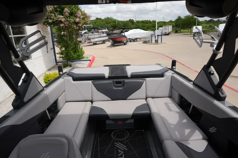 Slide: The Image of Interior of a 2021 ATX 24 Type-S surf boat, gray upholstery. - 25