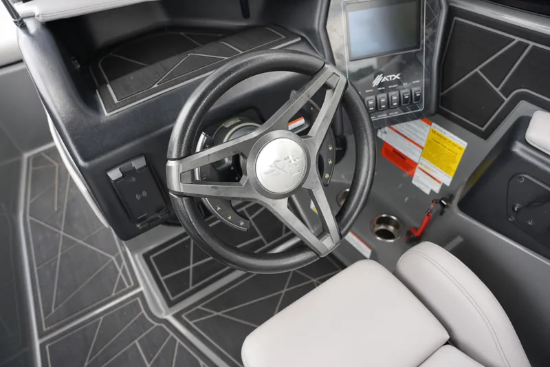 Slide: The Image of Interior view of ATX 24 Type-S boat, steering wheel and dashboard. - 35