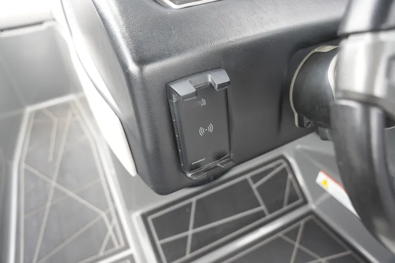 Slide: The Image of ATX 24 Type-S boat cockpit with charging dock. - 36