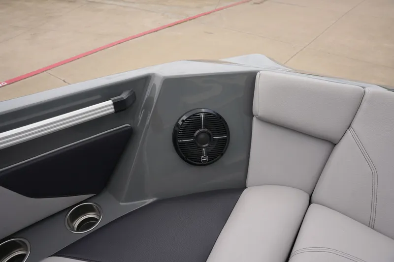Slide: The Image of Interior of ATX 24 Type-S boat, gray upholstery and speaker. - 43