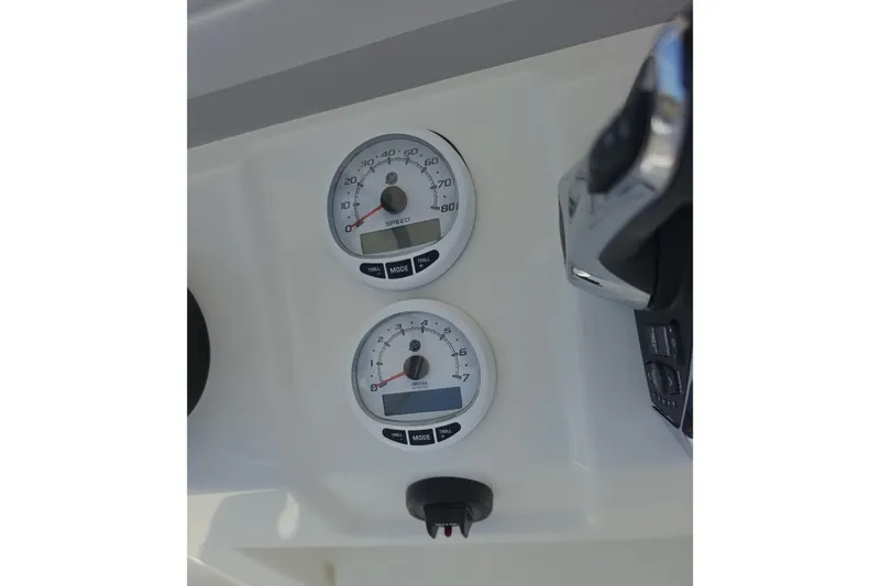 Slide: The Image of Dashboard of 2026 Mako 226 Center Console with speed and RPM gauges. - 9