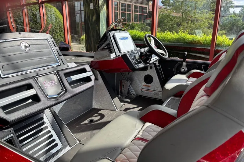 Slide: The Image of Interior of 2026 Ranger Z521R Cup-Equipped boat with modern dashboard and seating. - 4