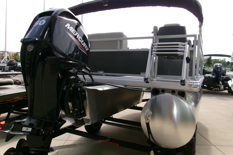 Slide: The Image of 2026 Sun Tracker Bass Buggy 16 XL Select pontoon boat with Mercury outboard motor. - 77