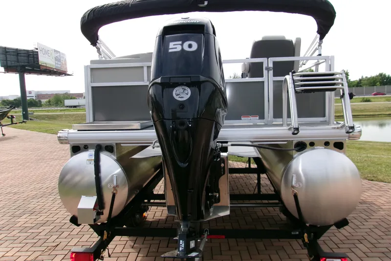 Slide: The Image of 2026 Sun Tracker Bass Buggy 16 XL Select pontoon boat with Mercury 50 engine. - 2