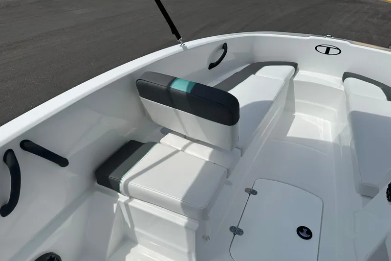 Slide: The Image of 2026 Tahoe T16 boat interior with sleek seating and modern design. - 16