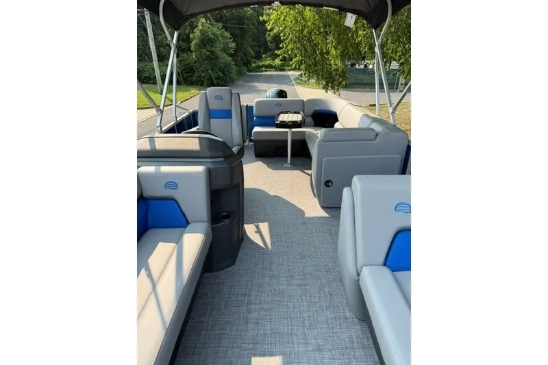 Slide: The Image of 2026 Sun Tracker Party Barge 20 DLX interior with spacious seating and modern design. - 7