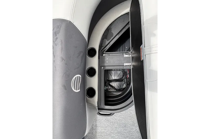 Slide: The Image of Interior view of 2026 Sun Tracker Bass Buggy 16 XL Select boat storage compartment. - 21