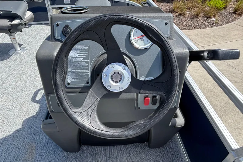Slide: The Image of Steering console of 2026 Sun Tracker Bass Buggy 16 XL Select pontoon boat. - 78