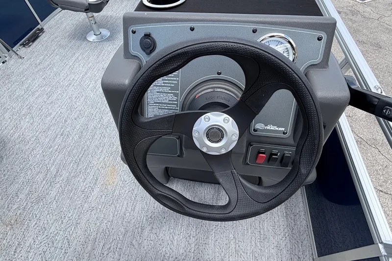 Slide: The Image of Steering console of 2026 Sun Tracker Bass Buggy 16 XL Select pontoon boat. - 17