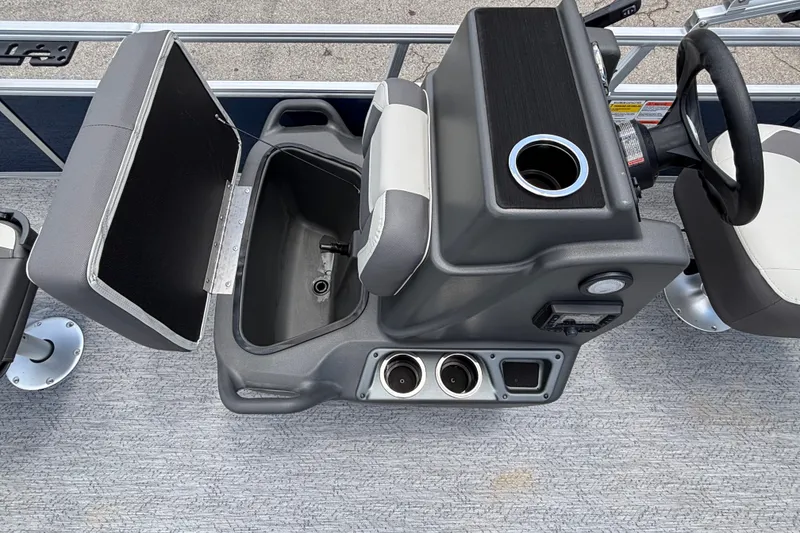 Slide: The Image of Interior view of 2026 Sun Tracker Bass Buggy 16 XL Select boat console and seating. - 16