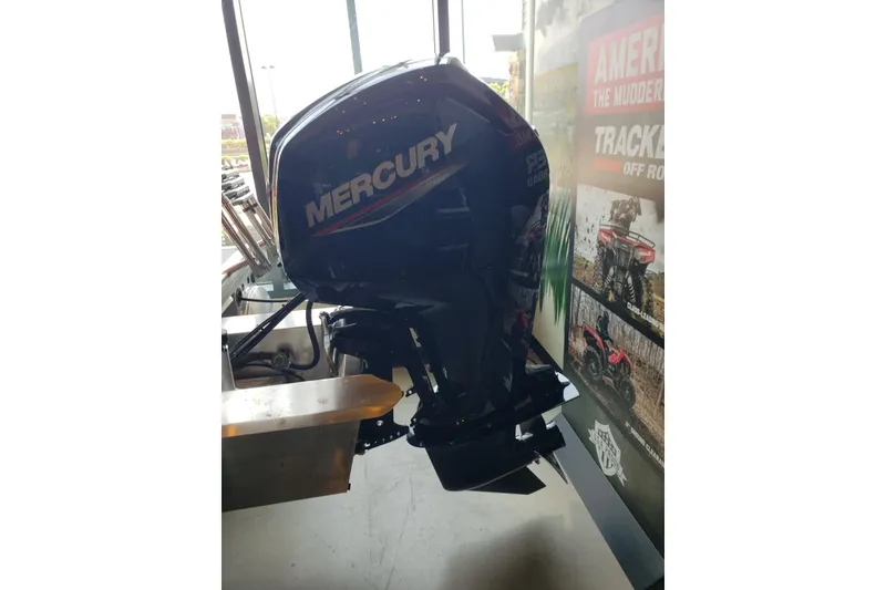 Slide: The Image of Mercury outboard motor on a 2026 Sun Tracker Party Barge 18 DLX pontoon boat. - 8