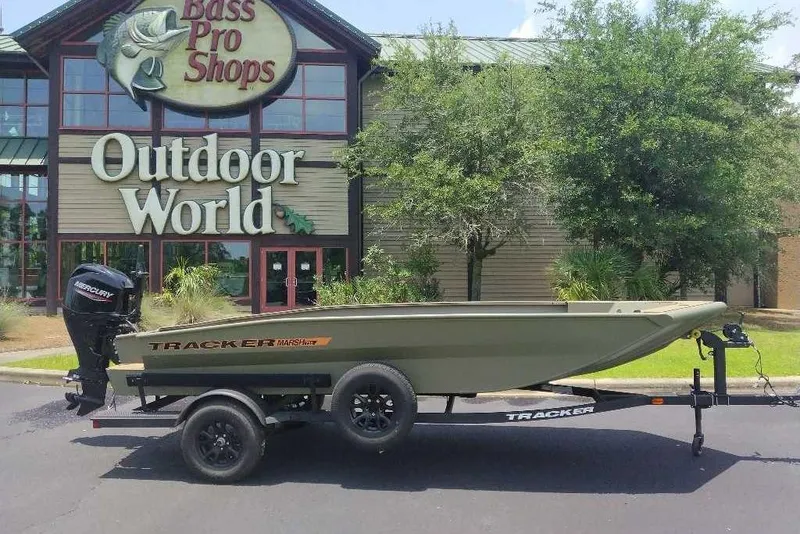 The Image of 2026 Tracker Grizzly 1756 T Marsh boat outside Bass Pro Shops Outdoor World. - 0