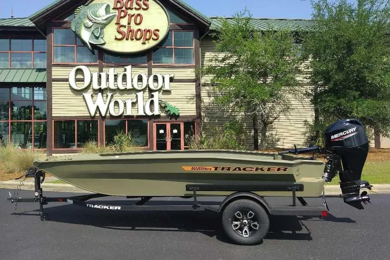 Slide: The Image of 2026 Tracker Grizzly 1756 T Marsh boat outside Bass Pro Shops Outdoor World. - 15