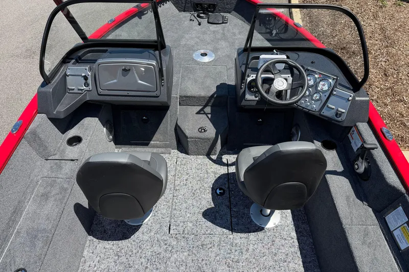 Slide: The Image of 2026 Tracker Pro Guide V-175 WT boat interior with dual seats and steering console. - 5