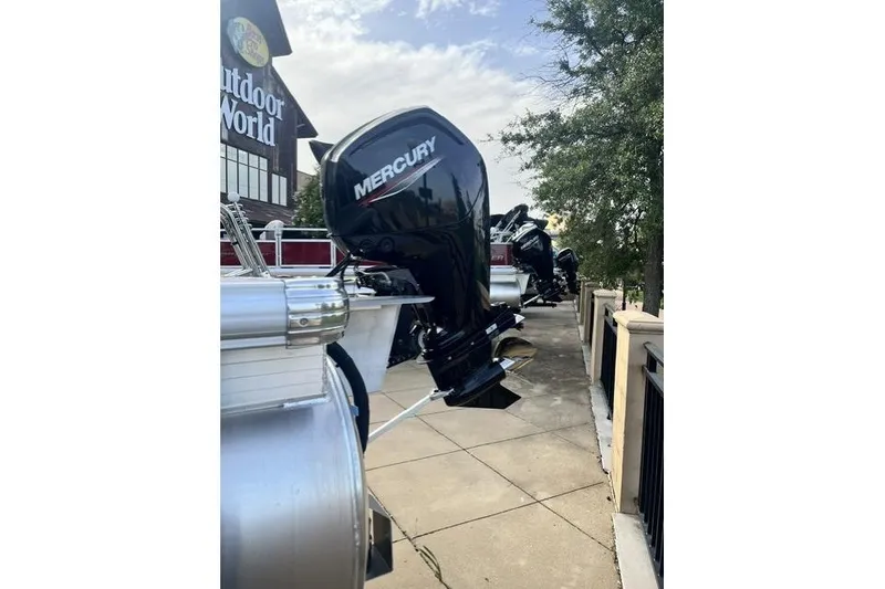 Slide: The Image of 2026 Sun Tracker Fishin' Barge 20 DLX with Mercury outboard motor at Outdoor World. - 7