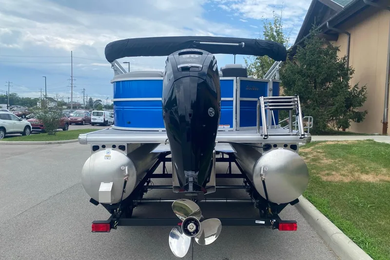 Slide: The Image of 2026 Sun Tracker Party Barge 20 DLX pontoon boat with powerful outboard motor. - 3