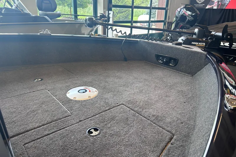 Slide: The Image of 2026 Tracker Pro Guide V-175 WT boat interior with Minn Kota PowerDrive trolling motor. - 3