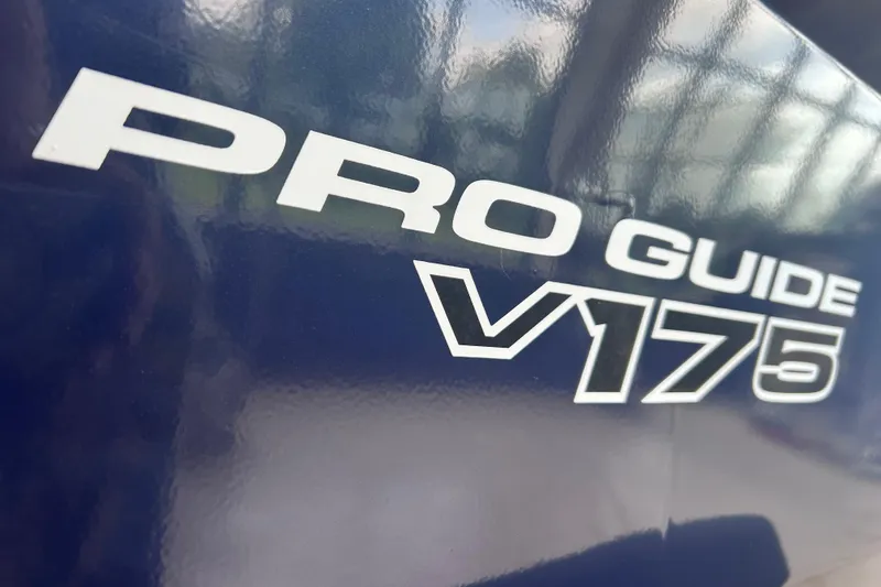 Slide: The Image of 2026 Tracker Pro Guide V-175 WT logo on a glossy surface. - 16