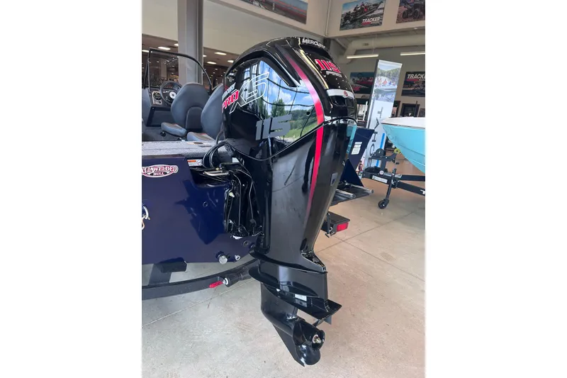 Slide: The Image of 2026 Tracker Pro Guide V-175 WT with Mercury 115 outboard motor in showroom. - 9