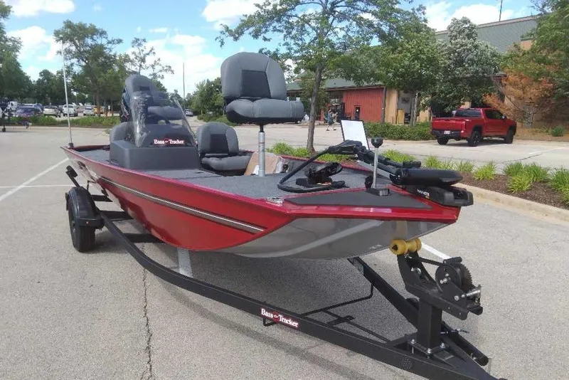 Slide: The Image of 2026 Tracker Bass Tracker Classic XL boat on trailer in parking lot. - 4