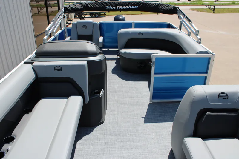 Slide: The Image of 2026 Sun Tracker Party Barge 18 DLX interior with spacious seating and modern design. - 7
