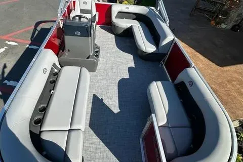 Slide: The Image of 2026 Sun Tracker Party Barge 16 DLX with spacious seating and modern design. - 2