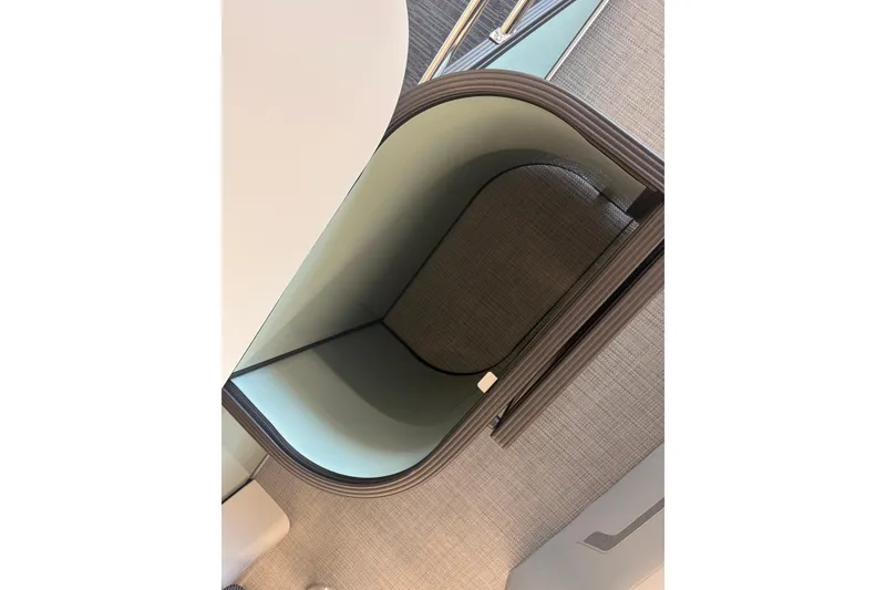 Slide: The Image of 2026 Crest Conquest 230 SLSC interior detail with modern design and sleek lines. - 14