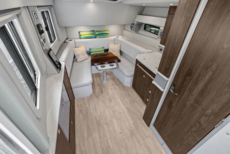 Slide: The Image of Luxurious interior of 2023 Formula 430 Super Sport Crossover with modern seating and wood accents. - 15