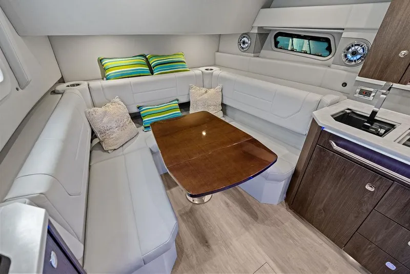 Slide: The Image of Luxurious interior of 2023 Formula 430 Super Sport Crossover with plush seating and elegant table. - 18