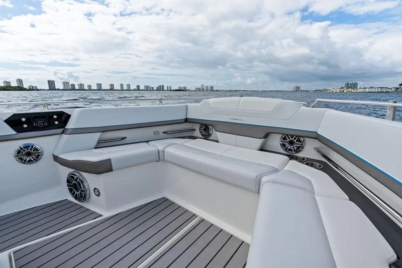 Slide: The Image of 2023 Formula 430 Super Sport Crossover boat interior with luxurious seating and ocean view. - 25