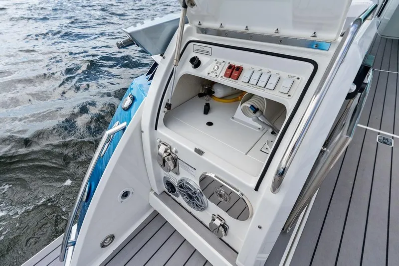 Slide: The Image of 2023 Formula 430 Super Sport Crossover boat control panel by the water. - 30