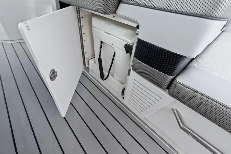 Slide: The Image of 2023 Formula 430 Super Sport Crossover interior storage compartment with open door. - 35