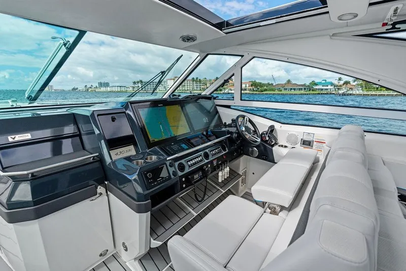 Slide: The Image of 2023 Formula 430 Super Sport Crossover cockpit with advanced navigation system and luxurious seating. - 39