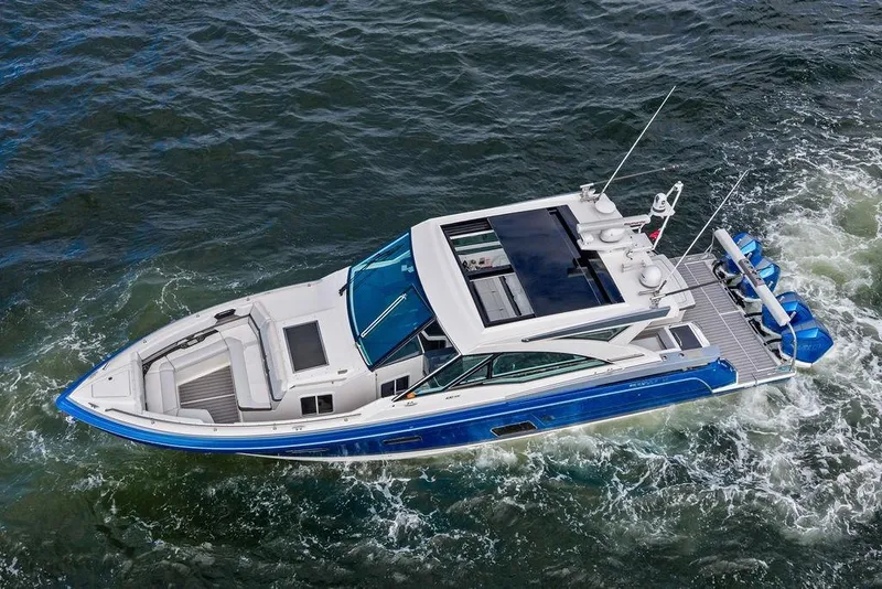 Slide: The Image of 2023 Formula 430 Super Sport Crossover cruising on water, aerial view. - 4