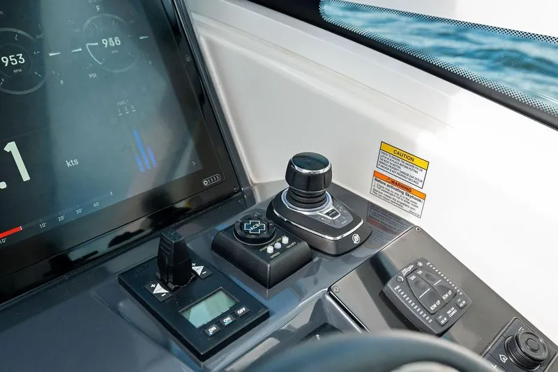 Slide: The Image of Control panel of 2023 Formula 430 Super Sport Crossover with digital display and joystick. - 42
